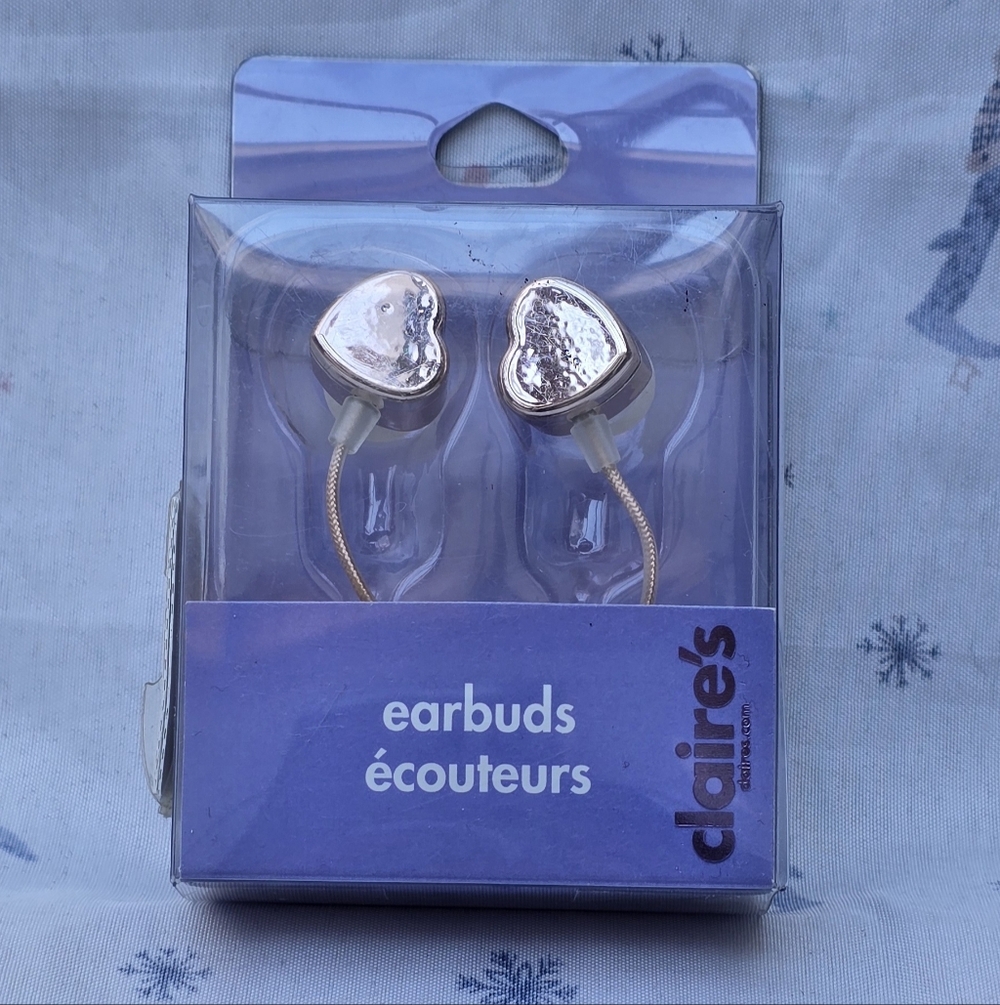 Claire's heart-shaped earbuds in a rose-gold tone finish.